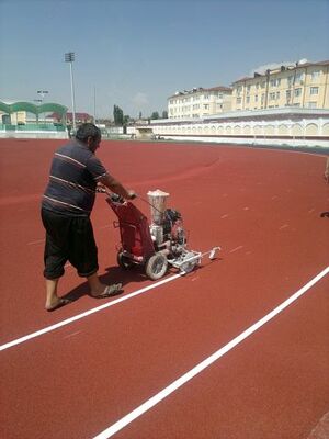   Укладка спортивного покрытия