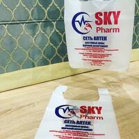 {0} so'mdan Sizning logotipingiz bilan plastik to'rva (ko'ylak).