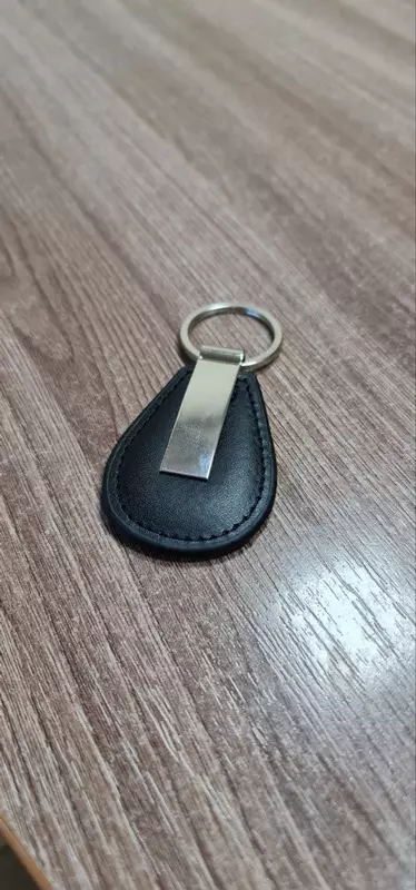 ООО "Сервис Вектор" - Брелоки с Вашим лого или фото