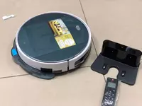 Умный робот-пылесос для сухой и влажной уборки от DEXP (Россия).