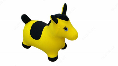 Мягкая игрушка ослик желтого цвета.