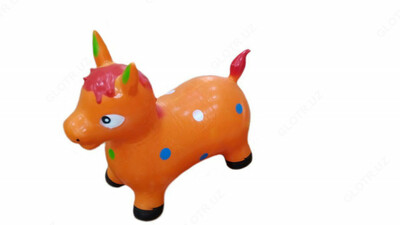 Резиновая игрушка ослик оранжевого цвета с цветными крапинками.