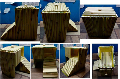 Двухэтажный домик оформленный камышом.