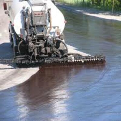 Обработка основания битумной эмульсией