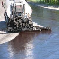 Обработка основания битумной эмульсией