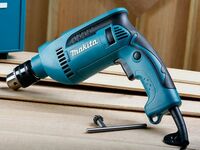 Ударная дрель Makita HP1640 - от {0} сум