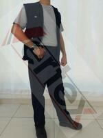 Спецодежда (жилет и брюки) - от {0} сум