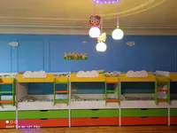 Детская дизайнерская кровать (4 яруса). Модель № 11 "Цветное ассорти" OOO "HIGH TECH"