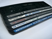 Реклама на рамках номерных знаков автомобилей