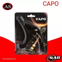 Каподастр для гитарных струн