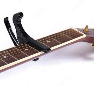 85 000 so'm / dona Gitara (capo) sotiladi