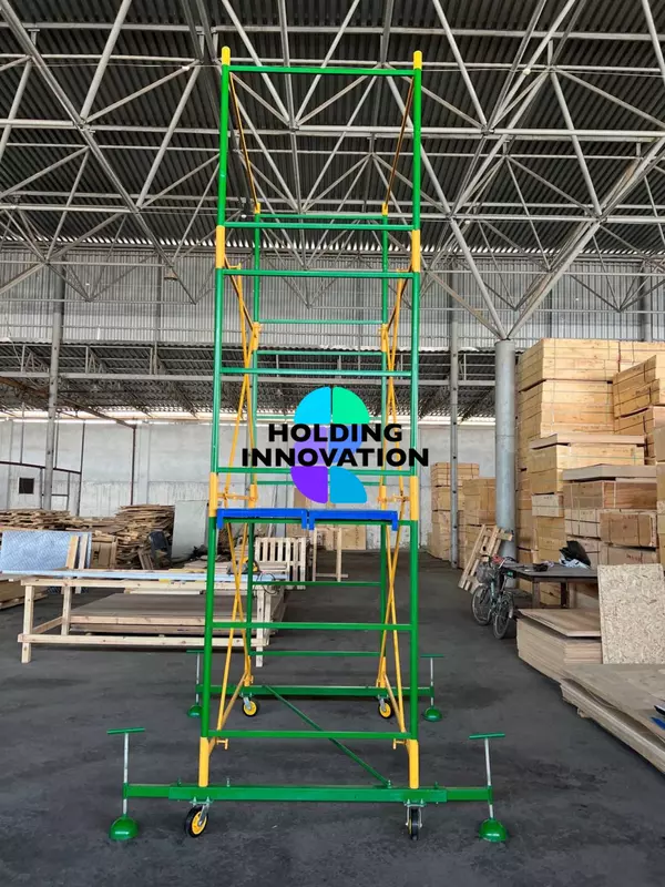   Леса на колесах (вышка-тура) с деревянными настилами в комплекте  изготовление от 3 до 15м в высоту
