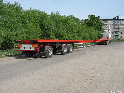 Автотранспортные услуги (Аренда Полуприцепа 30 т. площадка) - Цена по запросу