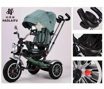 Велосипед- коляска трансформер - музыка - Резиновые колеса - подсветка-фары - несколько положений наклона спинки - разворот сидения на 180 градусов Детский транспорт