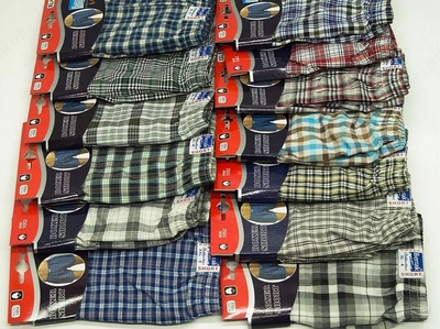 Мужские боксеры однотонные голубого цвета в клеточку