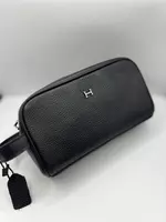Чёрная барсетка Hermès с золотым логотипом H