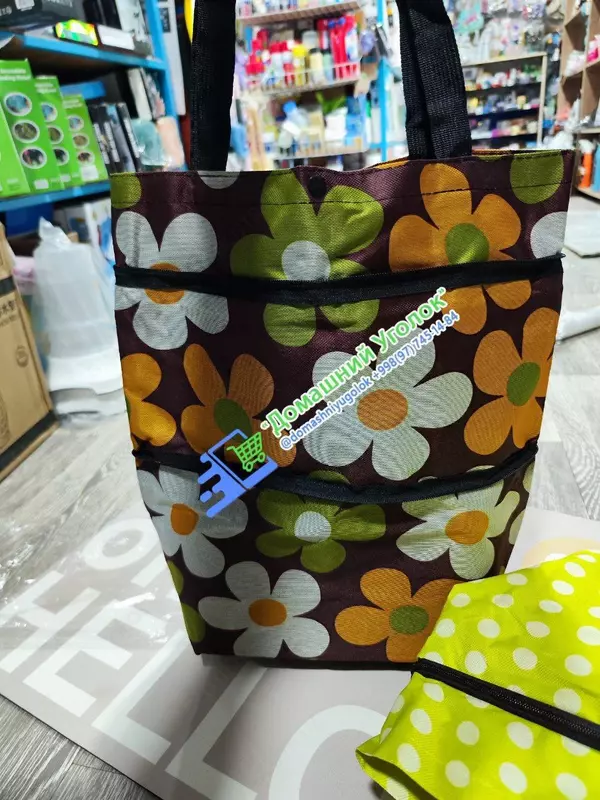  Домашний Уголок - Сумка-трансформер на колесиках  Современная сумка-тележка – это не только стильно  но и очень практично.  А её дизайн позволяет трансформировать сумку под необходимый Вам размер.  Вы сможете задейство