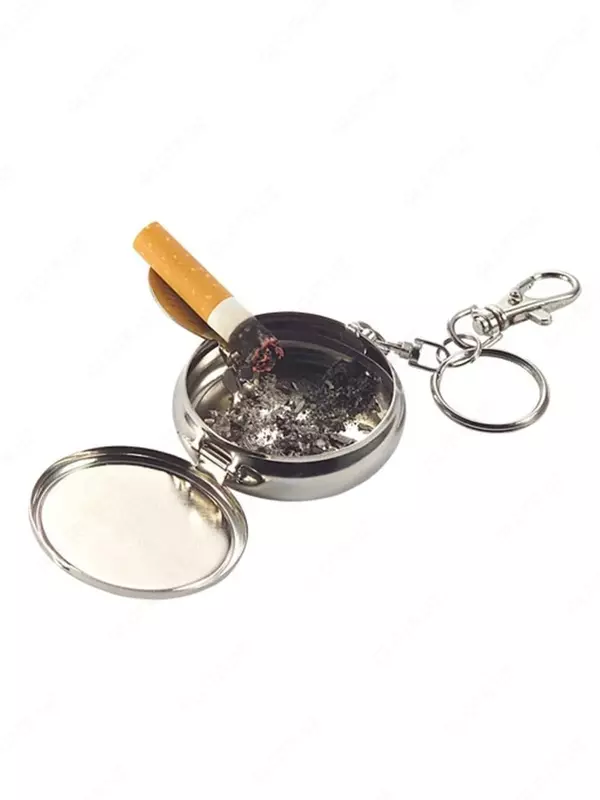 Карманная пепельница-брелок с подставкой для сигареты Портативная карманная пепельница, выполнена в виде брелока поэтому несомненно станет незаменимой вещью ! Аксессуар удобно использовать