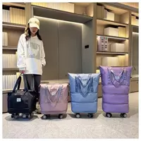 Дорожная сумка на универсальных колесах