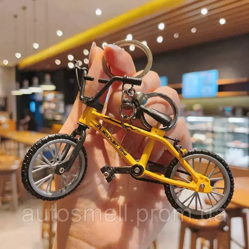 50 000 сум Брелок для ключей в виде велосипеда.