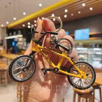 50 000 сум Брелок для ключей в виде велосипеда.