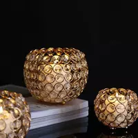 100 000 so'm Золотистый хрустальный подсвечник.