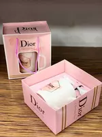   Керамическая кружка с ложкой.