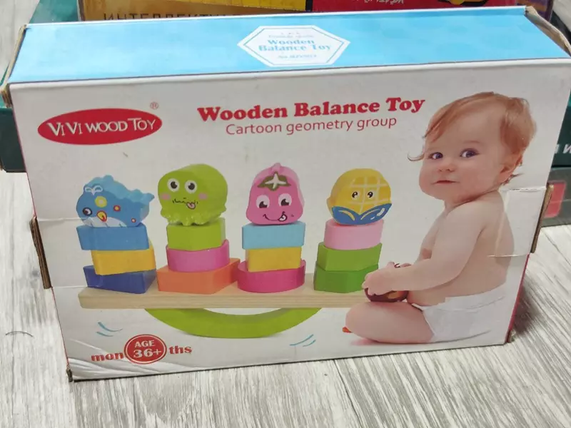 Деревянная игрушка балансир