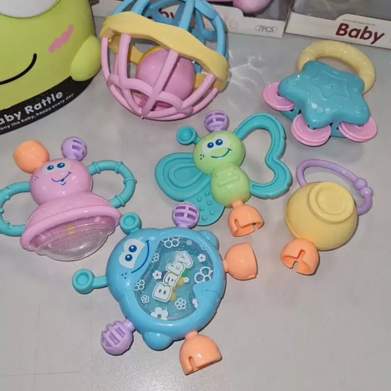 Набор погремушек в контейнере