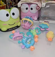 150 000 сум Набор погремушек в контейнере