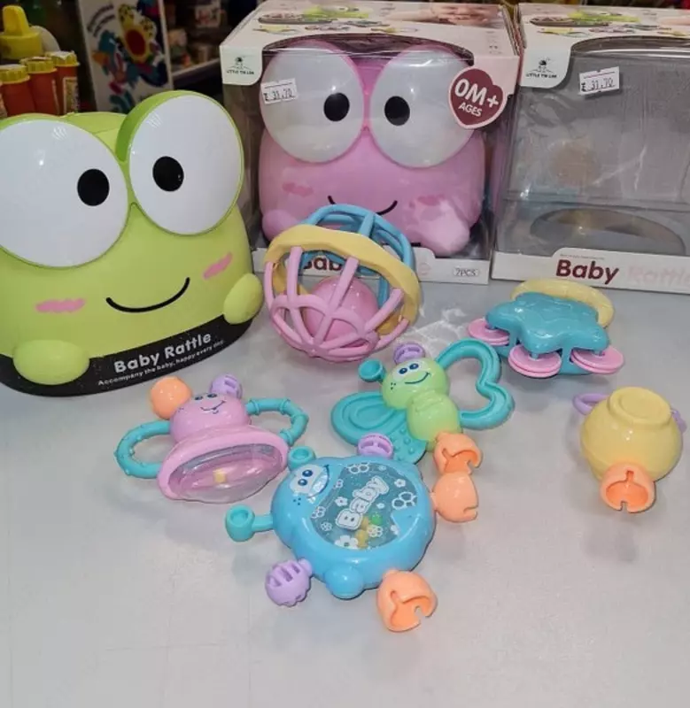 Набор погремушек в контейнере