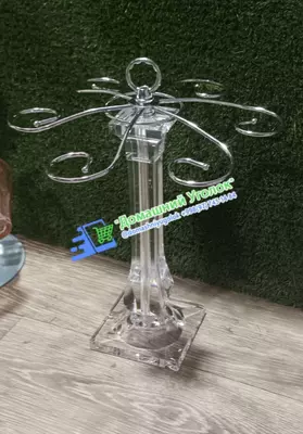 Вращающаяся настольная полка для бокалов.