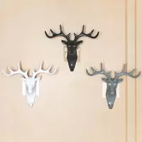 Кретивный настенный крючок в форме головы оленя.