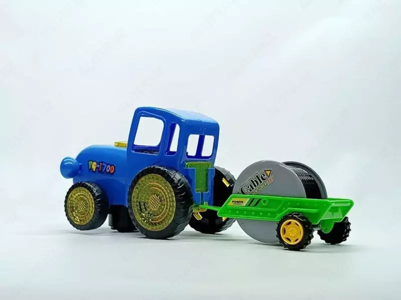 Музыкальная игрушка "Синий трактор с прицепом катушкой" от Star toys