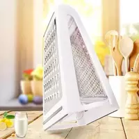 80 000 сум Двусторонняя терка с контейнером 2 в 1