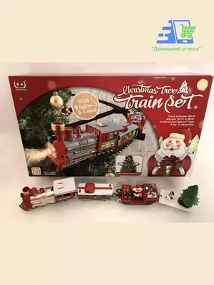 Новогодний электропоезд на ёлку со светом и звуком - ЯТТ "Домашний Уголок"