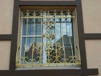 Кованные решетки для дома с узорами