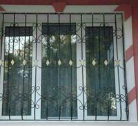 Кованные решетки и заборы для дома