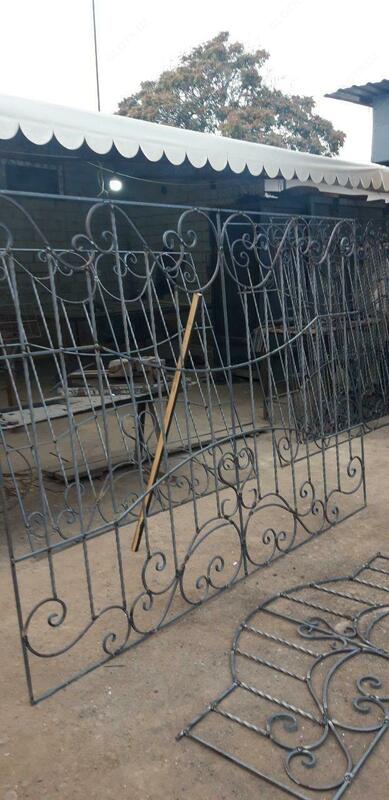 Кованные решетки и заборы для дома