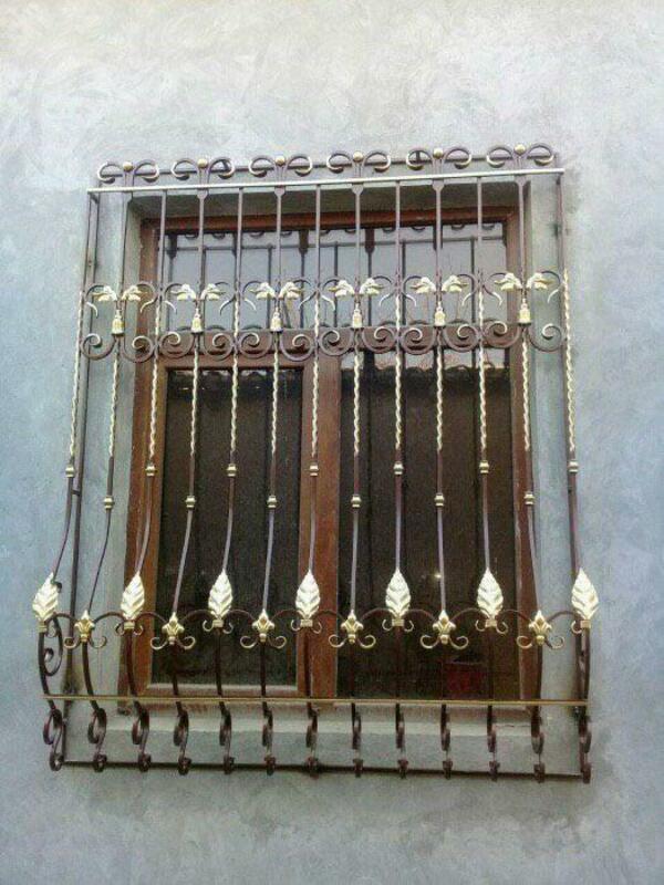 Кованные решетки и заборы для дома