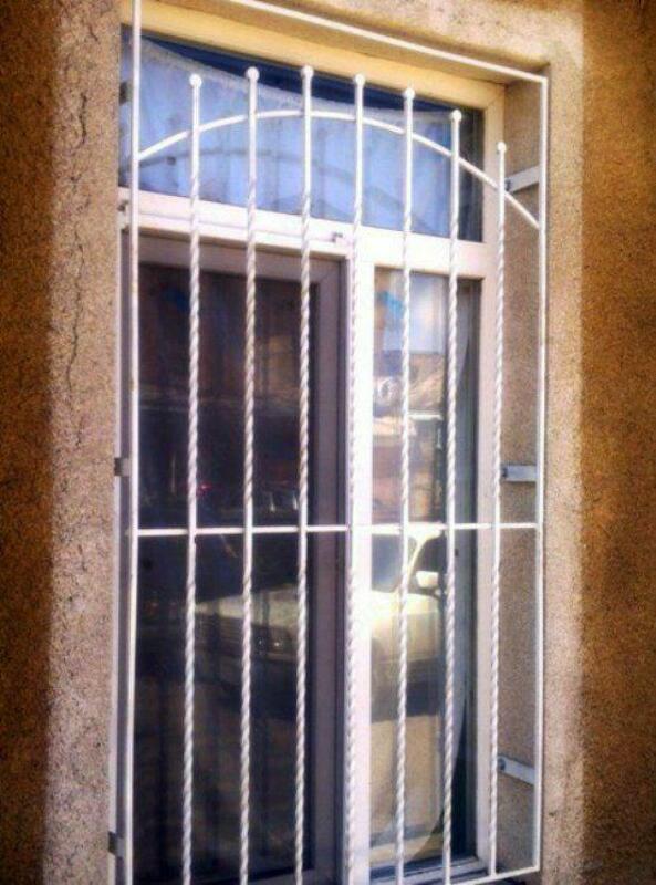 Кованные решетки и заборы для дома - по запросу