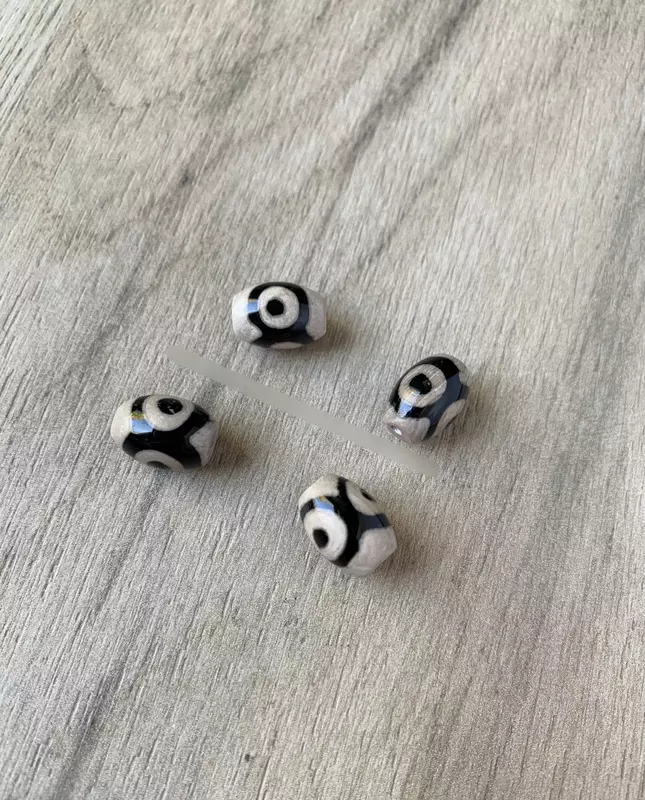 Трех глазковая бусина Дзи