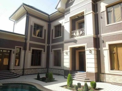 Фасадные отделочные работы травертином