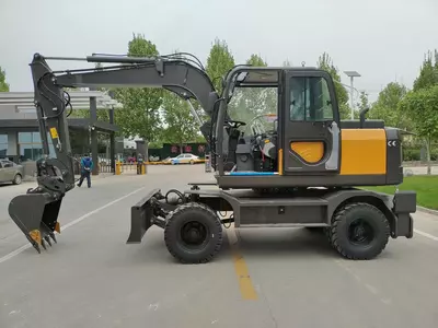 Колёсный экскаватор JH9075 TAVOL 62.5квт