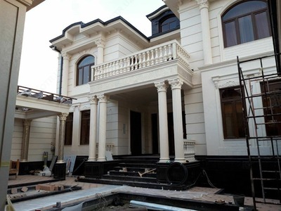 Облицовка и отделка фасада травертином