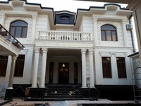 Облицовка и отделка фасада травертином - по запросу