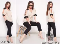 Ayollar yozgi kostyumi