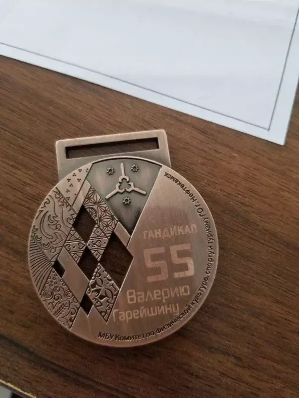 Изготовление медалей и значков - по запросу