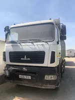 4 автомобиля МАЗ. Саноатқурилиш