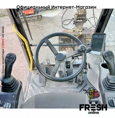 Колесный экскаватор Volvo EW140D